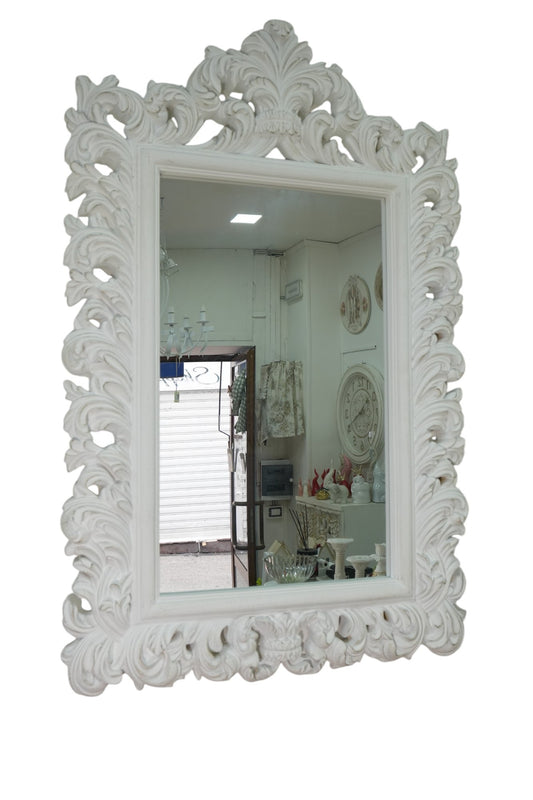 Specchio con cornice lavorata